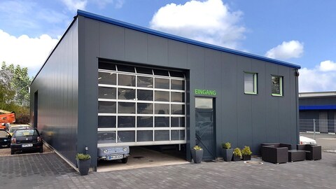 Werkstatthallen mit Hacobau GmbH günstig bauen als Systemstahlhalle Werkstatthallenbau