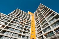 high-rise apartment building facade , real estate low angle view