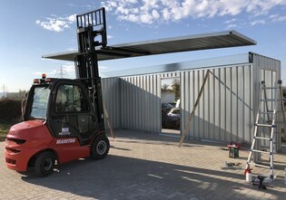 Reifenlagerhallen inkl. Reifenregale geliefert und montiert von Hacobau GmbH. Reifenlagerung für Autohäuser, KFZ Betriebe und Reifenhändler